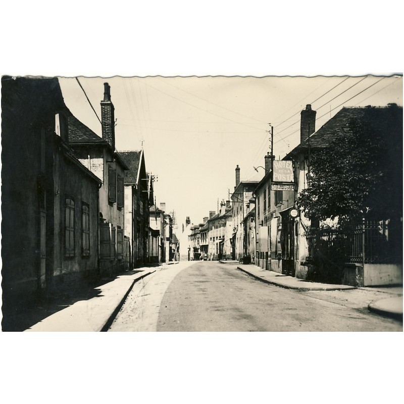 cp03-chantelle-le-chateau-la-rue-de-l-horloge