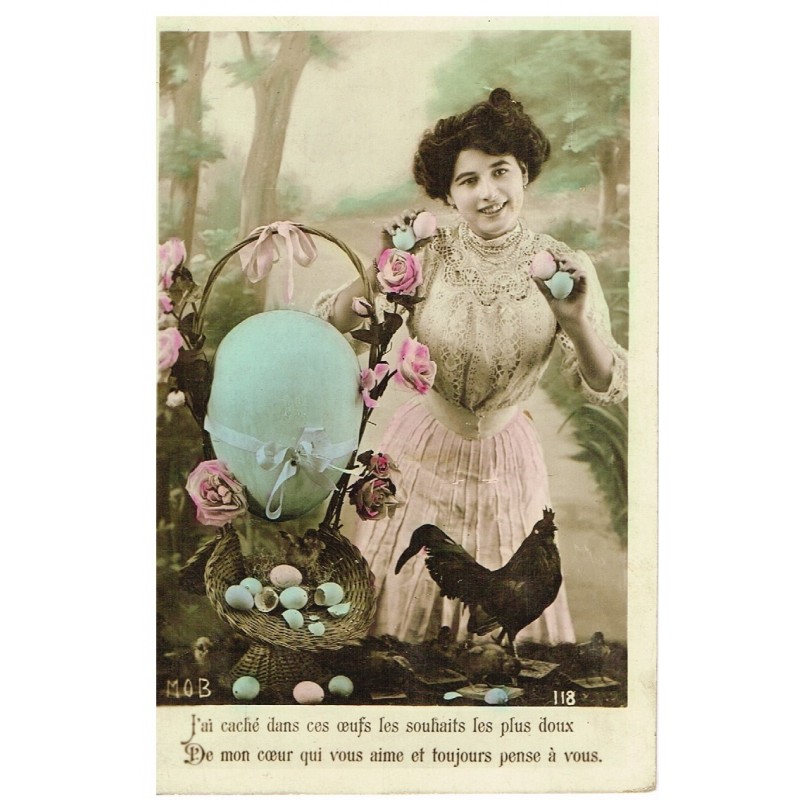 Carte postale PAQUES - JEUNE FEMME AVEC UNE CORBEILLE D'OEUFS