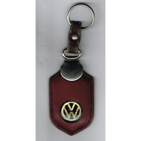 PORTE CLES  VOLKSWAGEN - LOGO OR SUR FOND NOIR DANS LE  CUIR MARRON.